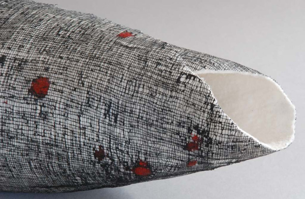 Detail: Shelter 1, 4"hx5"wx15"l, wool, cotton, wax, pigment, wet-felting, photo: Carmella Karijo Rother.