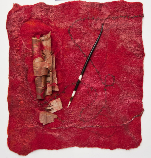 Freedom Writer, 2011, 14 H x 15.5W x 3 D inches, Merino wool, silk roving, wrapped Tsumugi silk yarn, embedded organics – birch bark and an appended African porcupine quill. Technique: Handmade felt – wet felting. Photo Rod Trider