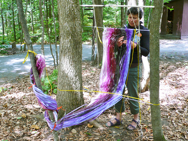 improvised studio, Sentier Art 3 Bois de Belle Rivière, Canada, summer 2010, medium: gift ribbon and stainless steel thread, technique: sprang, photo cre