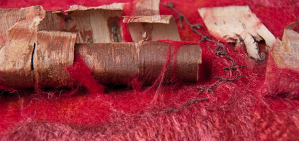 Detail: Freedom Writer, 2011, 14 H x 15.5W x 3 D inches, Merino wool, silk roving, wrapped Tsumugi silk yarn, embedded organics – birch bark and an appended African porcupine quill. Technique: Handmade felt – wet felting. Photo Rod Trider