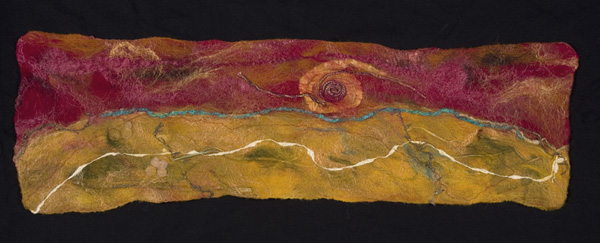 Horizon, 2011,30 H x 9W x 1 D inches, Merino wool, silk roving, wrapped Tsumugi silk yarn, cricula silk yarn, linen yarn, synthetic yarn, embedded organics – hemp bark, sweet grass, dried hydrangea flowers. Technique: Handmade felt – wet felting. Photo: Shawna Eberle