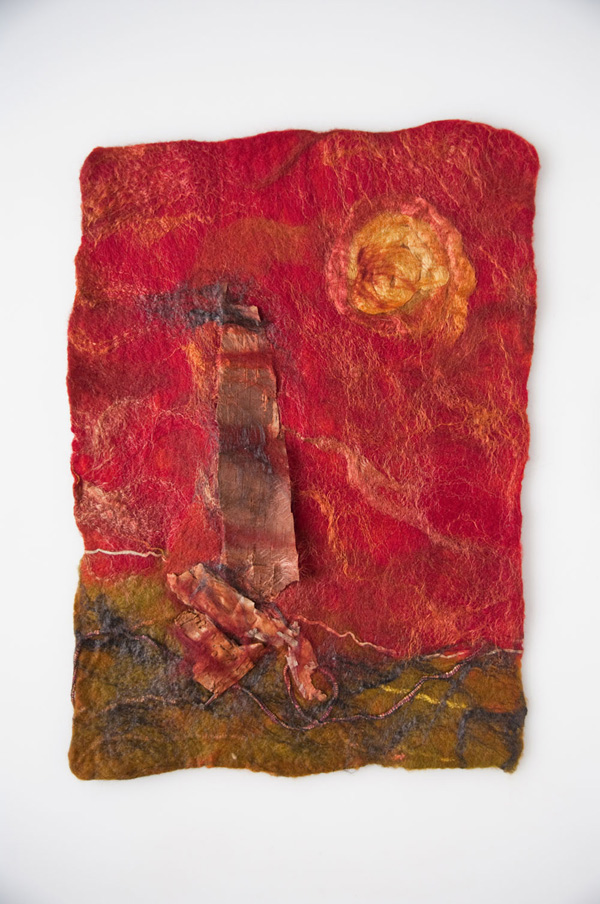 Lighthouse, 2011, 19 H x 14W x 1 D inches, Merino wool, throwsters waste silk, silk roving, alpaca roving, wrapped Tsumugi silk yarn, embedded, organics – birch bark, hydrangea bark, cherry bark. Technique: Handmade, felt – wet felting. Photo: Rod Trider