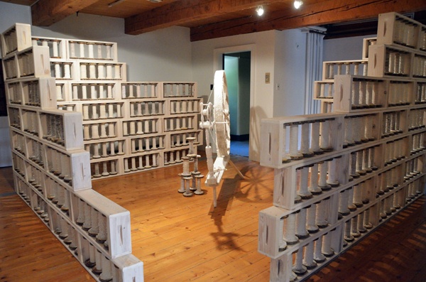 Spinning Jenny, salt and paper encrusted spinning wheel, 400 industrial bobbins filled with hand spun linen paper thread and encrusted with salt; hand built pine and hemlock shelves, 549 cm x 762 cm (room), 2013. Photo: Noelle Hamlyn