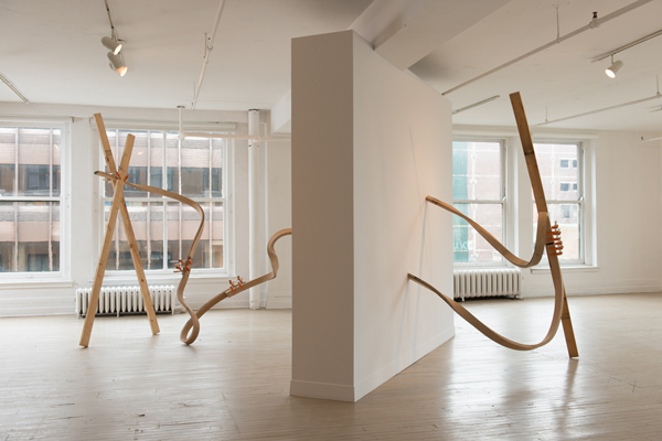 Spatial Drawing I, CIRCA Art Contemporain, Montréal, QC. Hand-bent hardwood (red oak), lumber, clamps, wall, 2012/2014, 108" H x 204" W x 72" D, wood-bending. Photo: Paul Litherland.