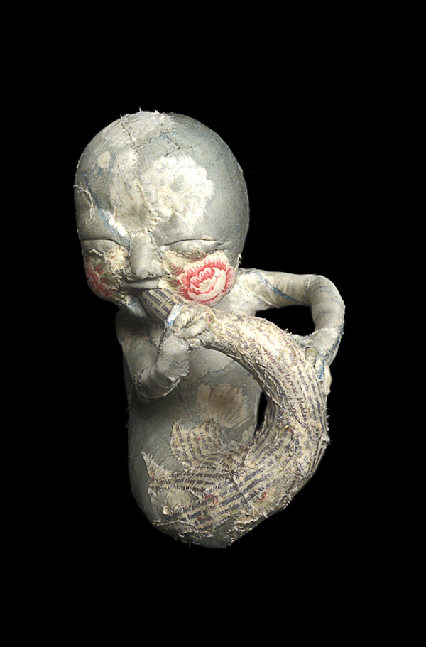 Ennui, 2000, 11" x 6" x 5", Antique fabric, human hair over wool, wire armature filled with rigid polyurethane foam, silk screen. Private Collection. Photo: Simon Glass.