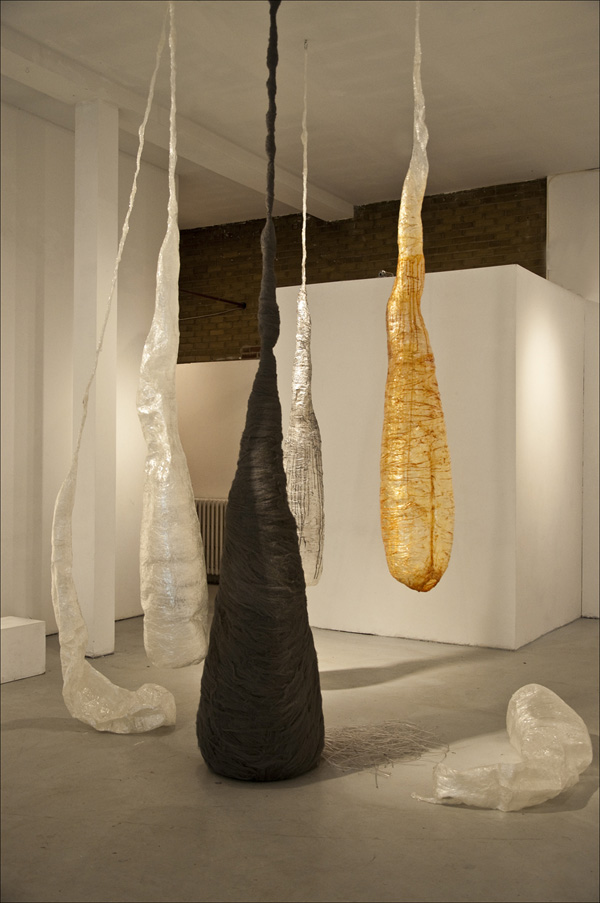 WifeMother; 2012; dimensions variable (approx 144"x30"x30"each piece); steel wool, adhesive tape, wire, skewers, stickers, acrylic paint, pvc filament