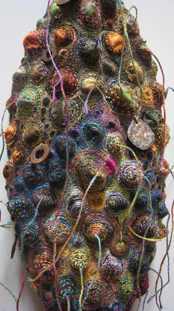 Circle of Memories 2, 2009, 10"x42", machine and hand-stitched felt.