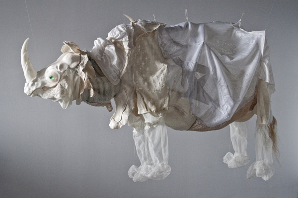 Dürer's Rhinoceros, 2011, 84" x 32" x 60", materials: resin, silicone, recycled textiles, flax., technique: casting, textile deconstruction, machine and hand sewing