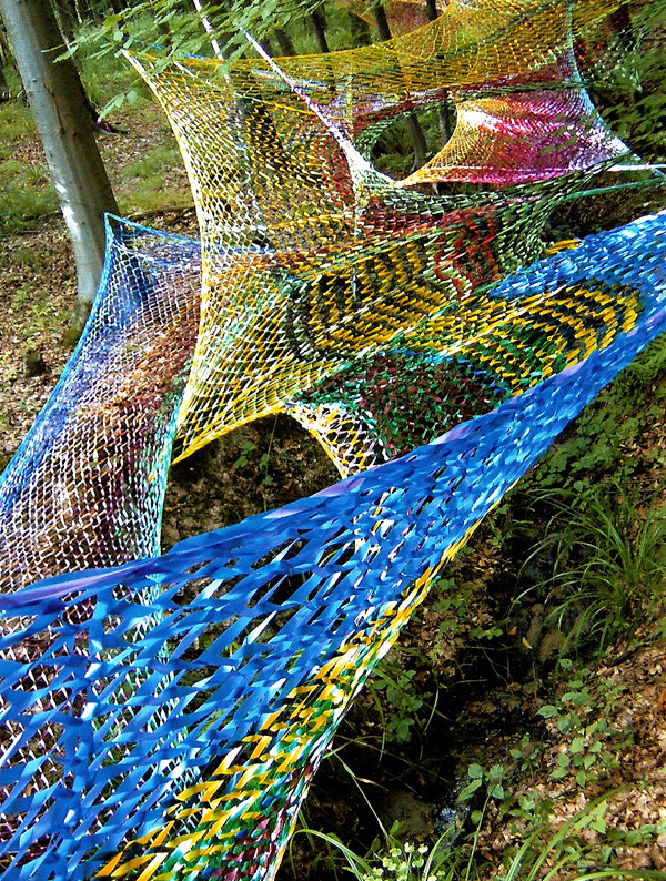 Entrelacs, Mont Pagnotte, France, été 2005, size: 12 elements, H: about 12m each, medium: gift ribbon, technique: sprang 