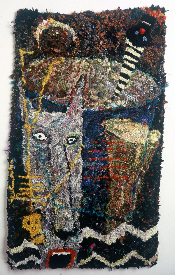 Drum rug. 1994 2' x 3' Scraps of all fabrics, from ball gowns to T-shirts to ribbons. Hand-hooked.