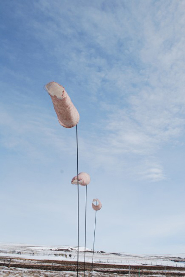 Air over land, 320 cm H, other dimensions variable. Linen, wool, steel, wind, knitting, felt. Photo: M Kelly-Frère.
