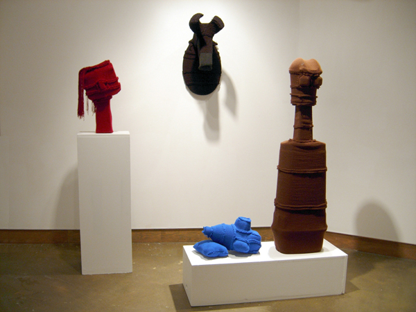 Heads, machine knitted natural and synthetic yarn, pillow stuffing, various plastic forms, 10 feet wide, 7 feet high, 2010. Photo: Andrew MacDonald.