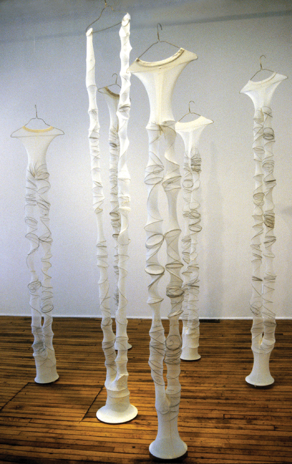 Heavenly Social, 1997 pantyhose, dinner plates and hangers, aprox.9' x 6'x 6'