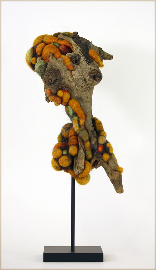 Diana – 7 x 9.5 x 6 in., wool and found driftwood; needlefelting. Photo by artist.