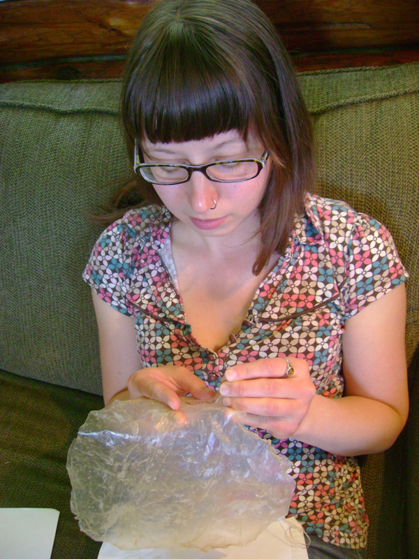 Heather embroidering pig intestine, 2011, photo: Greg Hanec