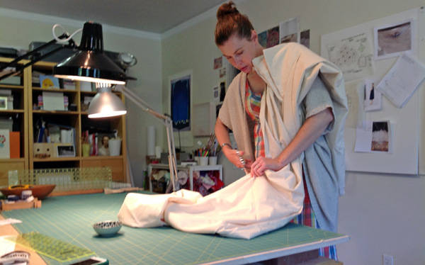 Cutting muslin for making studies, photo credit: Zoey Clark.