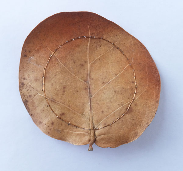 Couched leaf, hand stitched sea grape leaf (c