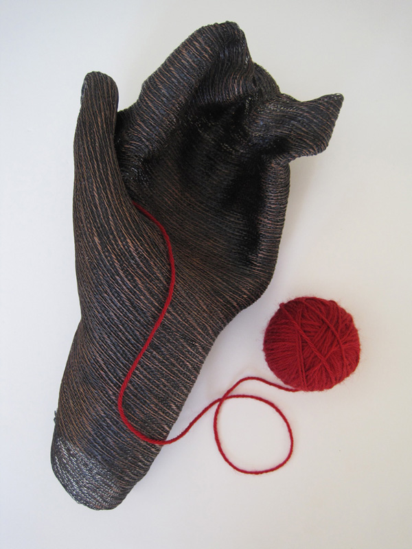 Lifeline (I'm Going to Live Forever), 2011, Hand-woven, hand-manipulated copper wire in undulating twill with patina, varnish and red acrylic yarn. 25 cm h by 25 cm w by 3 cm d.