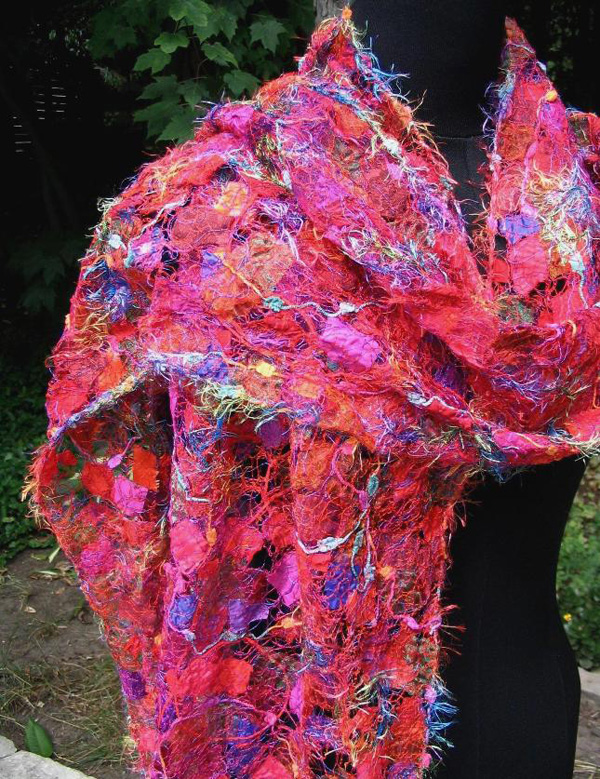 Joie de Vie shawl, 18" x 80"; materials: assorted fabrics, cords and threads; techniques: some dyeing, thread-web, freemotion embroidery – this piece was exhibited in the 2009 Common Thread International Juried Exhibition at the Joshua Creek Heritage Arts Centre