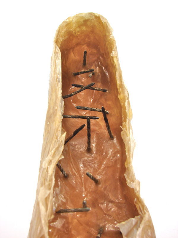 In Her Shoes Detail, 2012, 15 H x 25 W x 9 D cm, Tissue Paper, Encaustic Wax and Rusted Nails