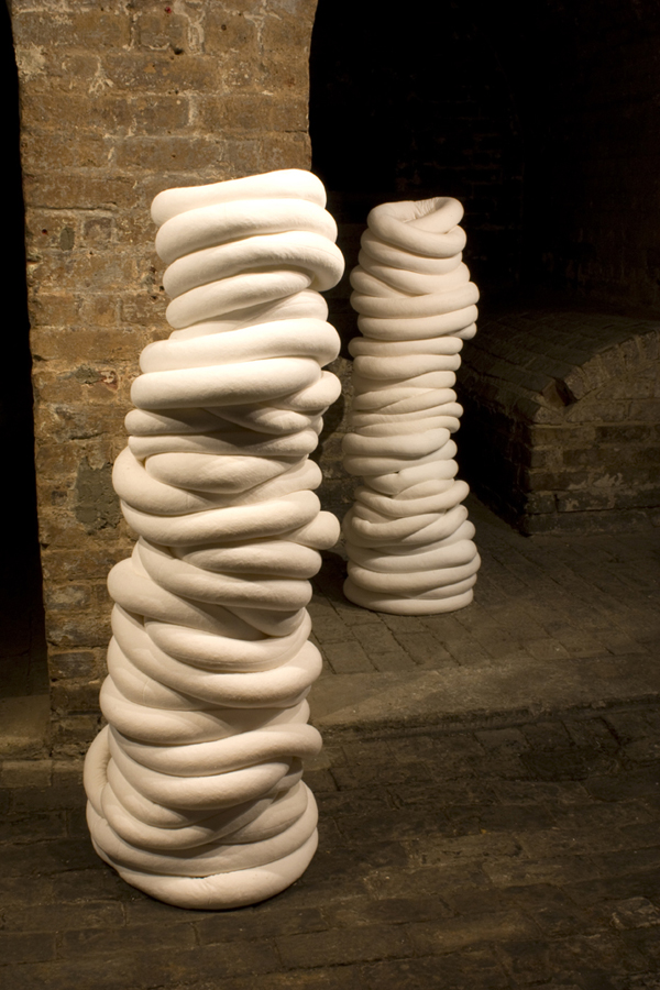becoming … , 2009-2011, 7 columns each 140 x 40 x 40cm, cotton velvet, polypropylene pellets