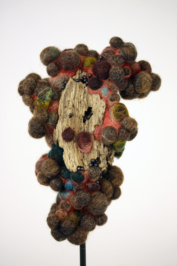 Colony – 4 x 6 x 4 in., wool and found driftwood; needlefelting. Photo by artist.