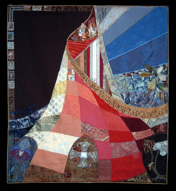 "Light Shineth in Darkness", appliqué, stencilling, photo transfers, 137 x 153 cm (54 x 60 in). Commissioned for Church of St John the Evangelist, Port Hope ON by Canon John Read and Family to honour the memory of Bishop Allan and Beverley Read. Photo: Paul Kay. John's father, Bishop Read, would begin each Christmas Eve service by reciting in the darkened church the Prologue to St. John's Gospel. The tapestry represents his ministry which enlightened and embraced many people and cultures.