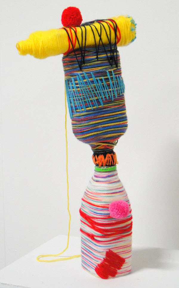 Untitled, found plastic, wool, thread, glue, 2013, 60 cm x 25 cm x 6 cm, wrapping, glueing and darning. Photo: Louise Keen.