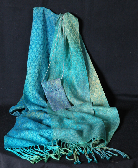 Peacock: Handwoven and dyed silk scarves and matching mini bags. Photo credit: Pete Herlihy
