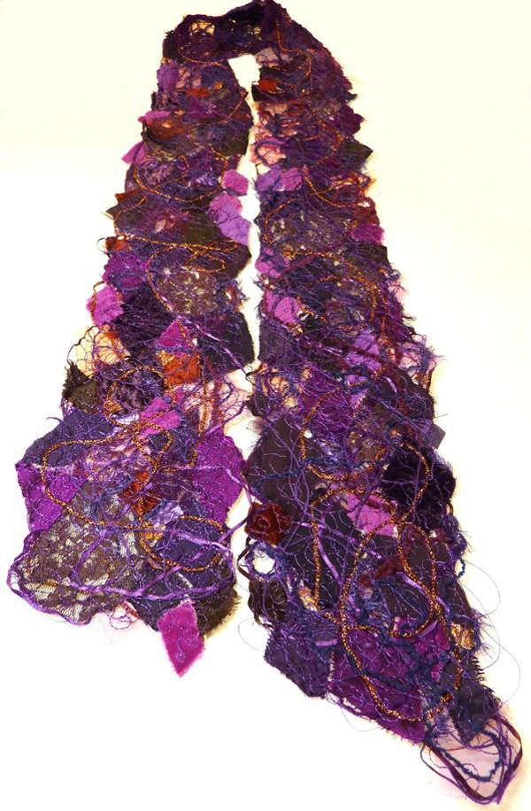Purple Patch scarf, materials: assorted fabrics, leather, lace, yarns and threads; techniques: hand dyeing, thread-web, freemotion embroidery
