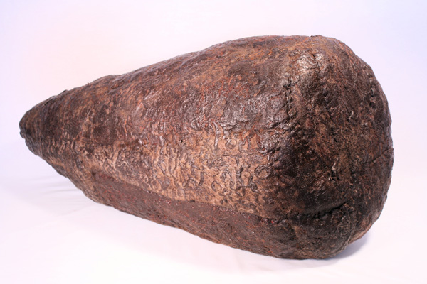 POD (Earth), wool, beeswax, thread, pigment, recycled fill, 2013, 16" x 30" x 15", hand-felted, stitched, encaustic. Photo: Merce Mitchell