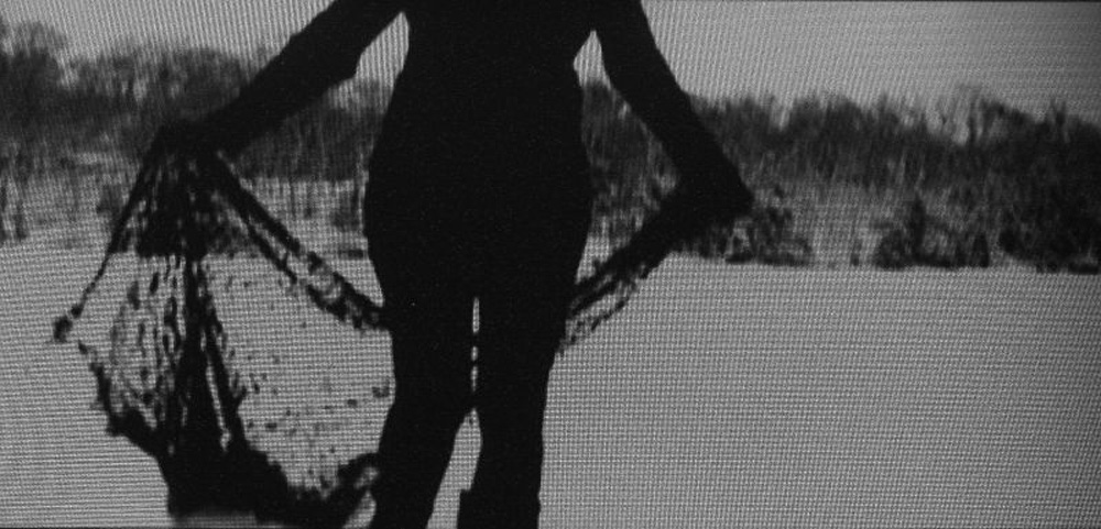 Penelope's Shroud, video still projection for unravel and thaw installation, 2006, size varies