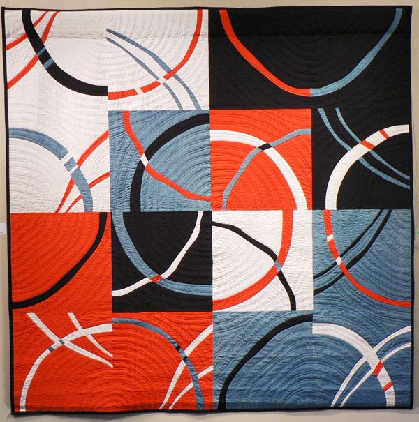 Skating, 71in. x 71in., cotton hand-dyed by artist, hand quilted by Edna Koepke.