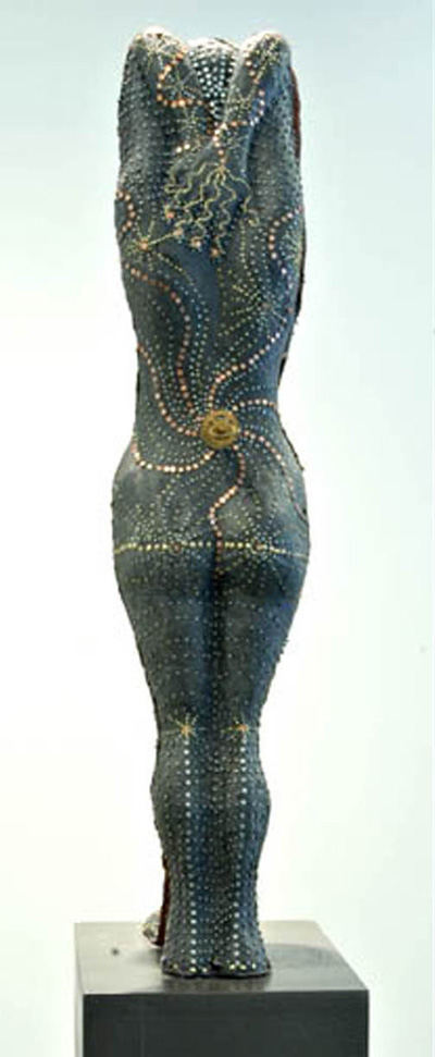 Iron Maiden: (back), 29"x11"x7", Japanese paper, wax, nails, pins, brass wire, steel, watch parts, wood.