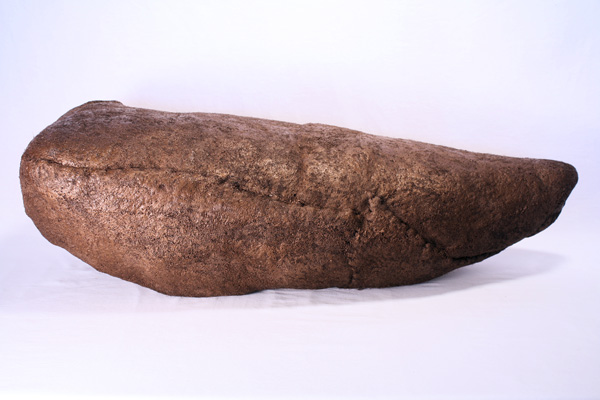 OD (Bronze), wool, beeswax, thread, pigment, recycled fill, 2013, 10.5" x 35" x 14", hand-felted, stitched, encaustic. Photo: Merce Mitchell