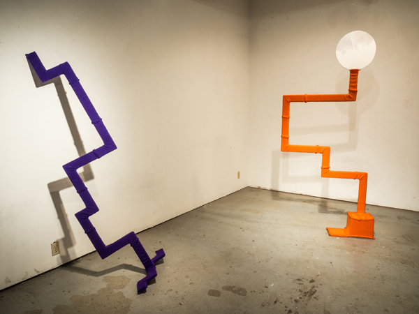 Bent out of shape, the failed search for meaning, Wood, machine knitted synthetic yarn, paint, Left work: 80 inches high, 22 wide x 30 deep. Right work: 86 inches high, 41 wide x deep, 2013. Photo: Andrew MacDonald.