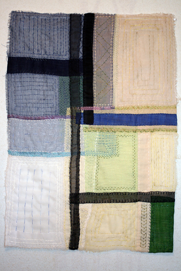 Sampler. 20 x 28, created on a foundation of silk organza, with layers of scrim, linen, and silk, hand stitched with pearl cotton and embroidery threads. Photo: Rosemary Claus-Gray