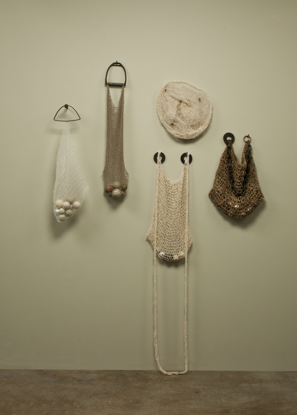 Installation Sacks 2, 2011, 79.75" x 68" x 6.5", Silk, jute, monofilament, linen, wood, paint, iron. Technique crochet. Photo: John Carlano.