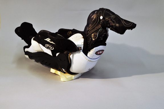 Loon, recycled hockey gear, 12" x 11" x 23", 2011.