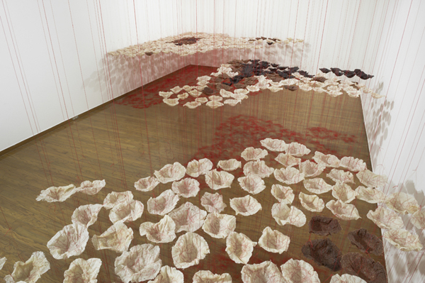 Rice is Life, detail, sushi, red & black rice, threads, 2014, tied threads, cooked rice, installation: Everson Museum, Syracuse, New York, USA, photo: David Broda.