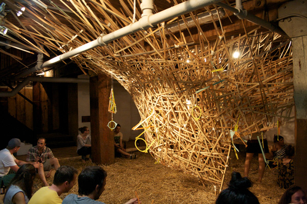 D_RAW installation of woven wood strips at the RAW Gallery with Ronnie Araya