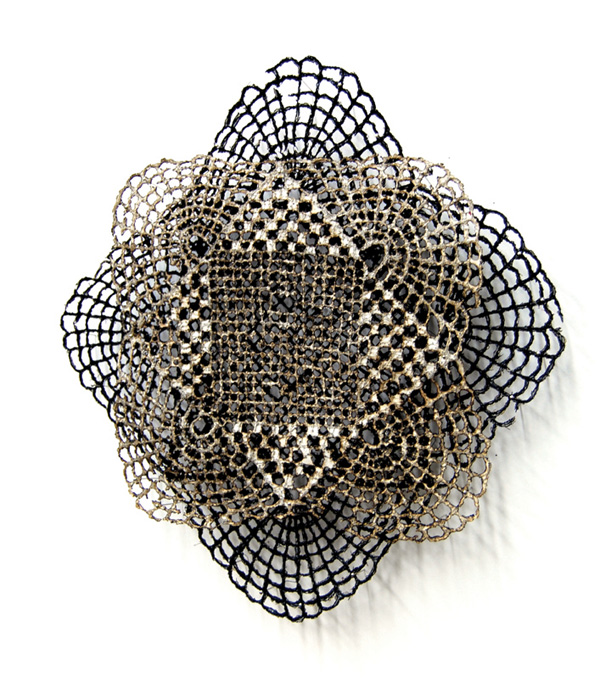 Optical Lace Repeat, 2011, 27.5cm h x 29 cm w x 5 cm d, Paper, free-motion embroidery, Thread, konnayaku starch, burn-out. Photograph: Lizz Aston
