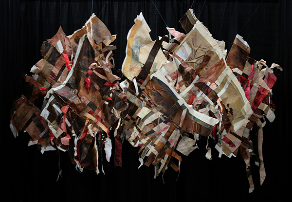 Come Undone, (Contemporary Art Fair, NYC) Acrylic & Oil on Canvas, Linen & Paper with Wire, 2013, dimensions variable, hand woven installation. Photo: Courtesy of the artist.