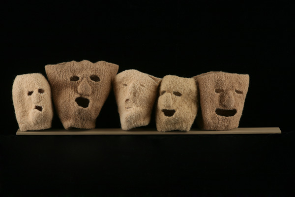 On Edge, 10"H x 33"W x 5"D, Knitted Wool, Fulled, on painted board