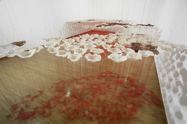 Rice is Life, detail, sushi, red & black rice, threads, 2014, tied threads, cooked rice, installation: Everson Museum, Syracuse, New York, USA, photo: David Broda.