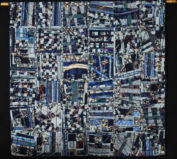 Pollock on the silk road, 60 x 60", Japanese indigo fabric, miscellaneous cotton fabric, leather and suede couching strips
