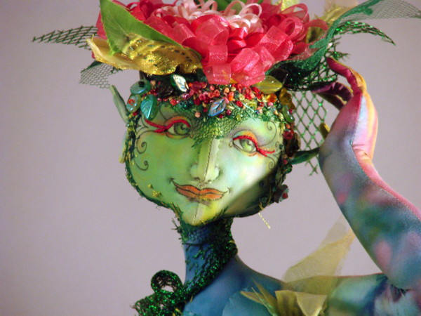 Detail: All dressed up, 20" H, hand dyed cottons, silk, lace, chiffon, netting, beads, wire, wooden stand, ribbon, pencil crayon, fine point markers.