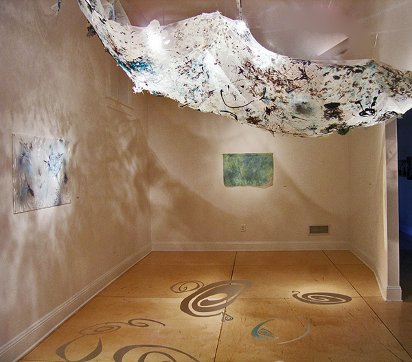 Above, Below and Beyond, dimensions variable, industrial mesh, paint, Walkers Point Center for the Arts, reflective material/stickers, Milwaukee, WI. Photo: Cathy Breslaw.