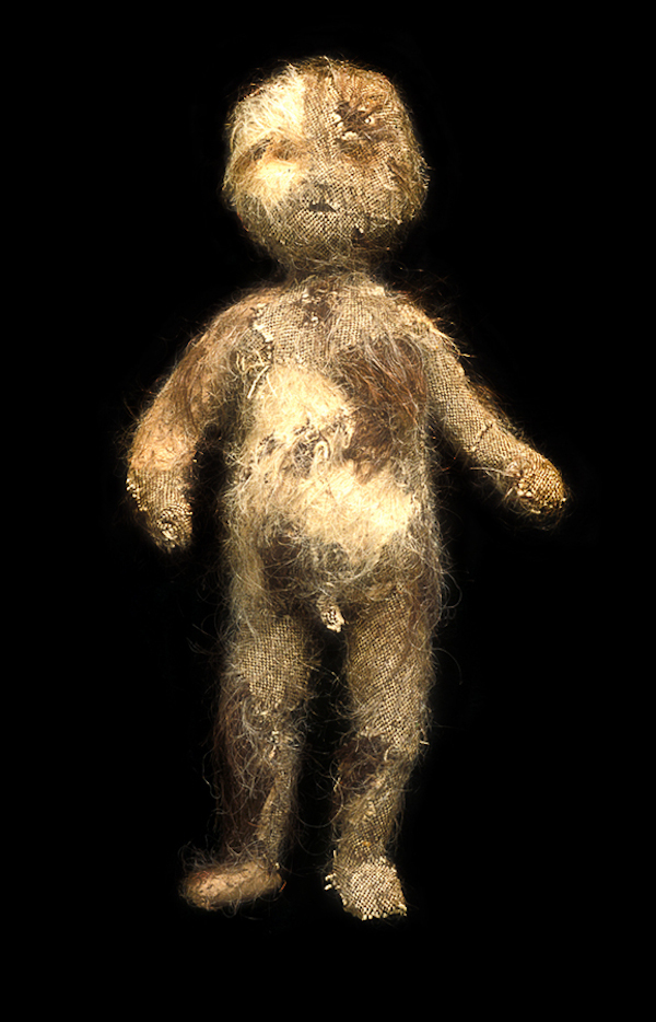 Efflorescence, Figure approx. 14" tall, 1997. Child's wool coat, human hair, armature (wool, wood, wire). Photo: Cheryl O'Brian.Collection of the Art Gallery of Hamilton.