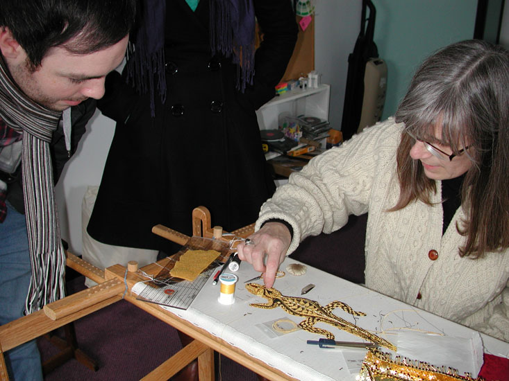 Cynthia Jackson giving a demonstration of goldwork technique. photo: Kim Sloan
